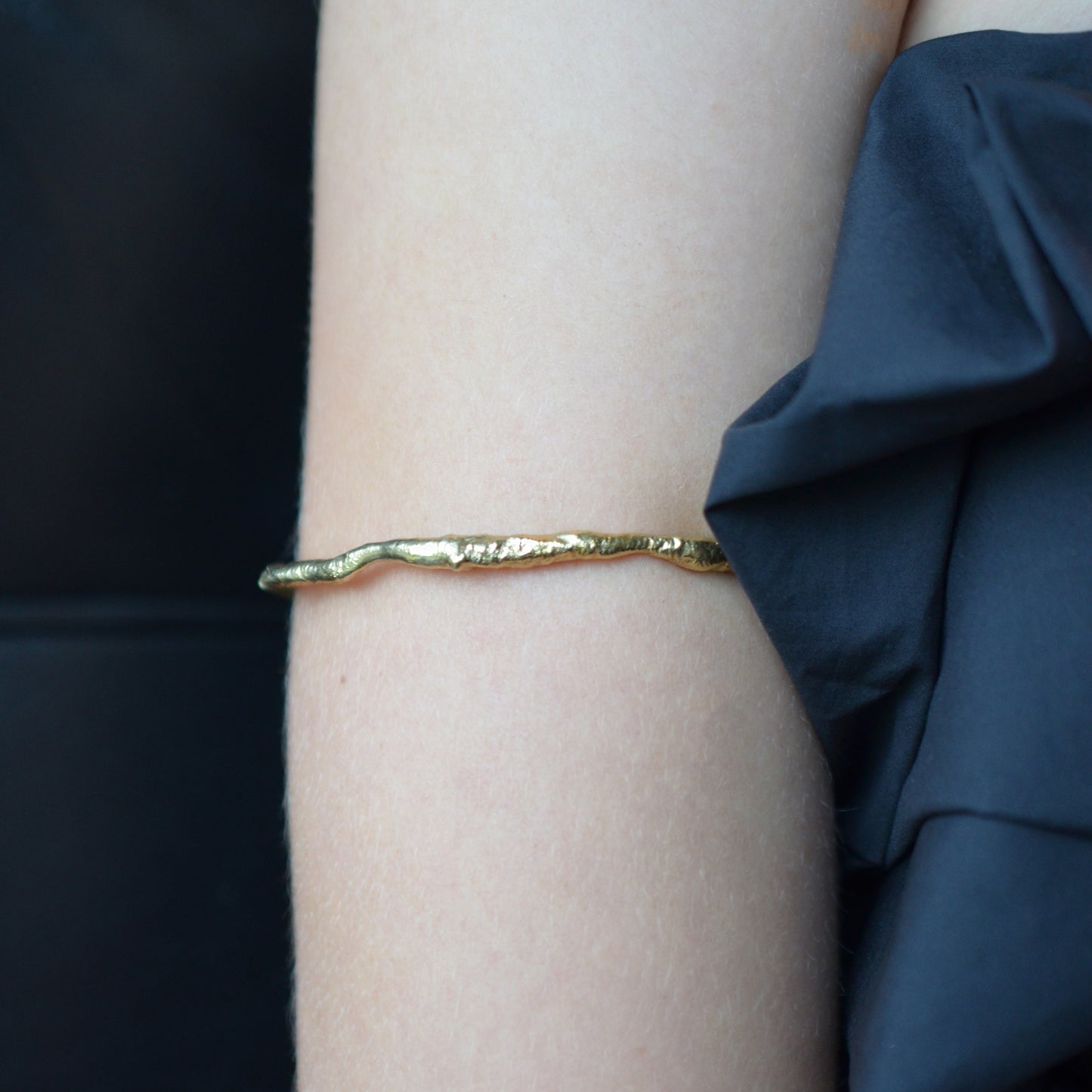 Molten gold bangle