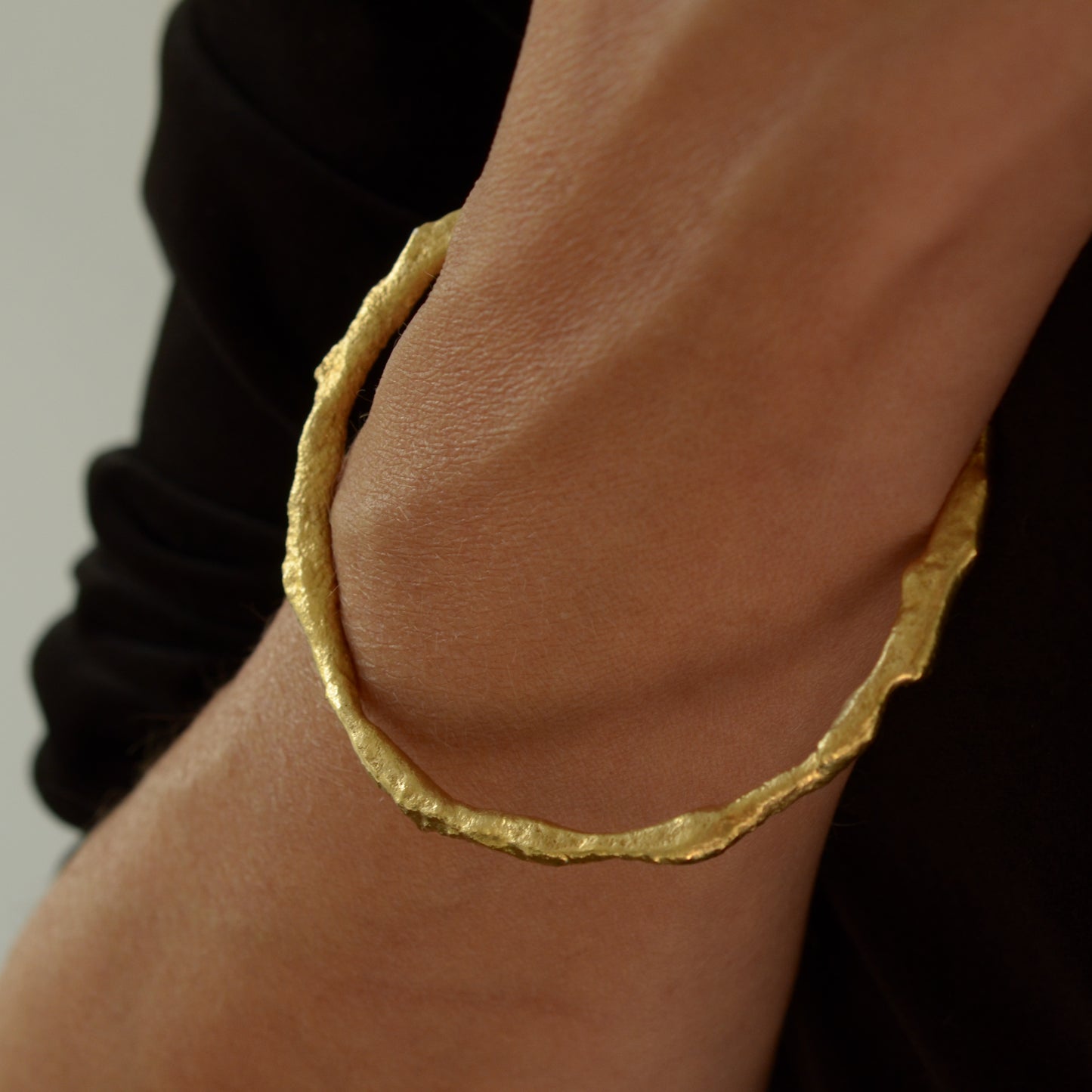 Molten gold bangle