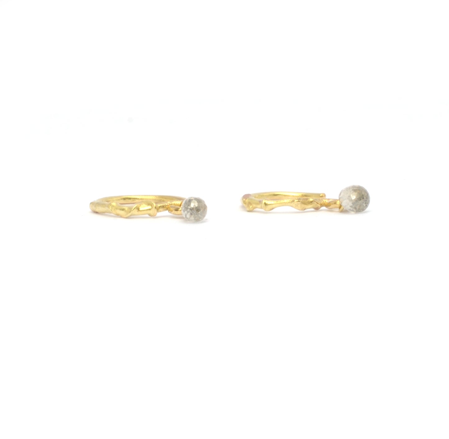 Molten gold hoops with diamond briolette drop