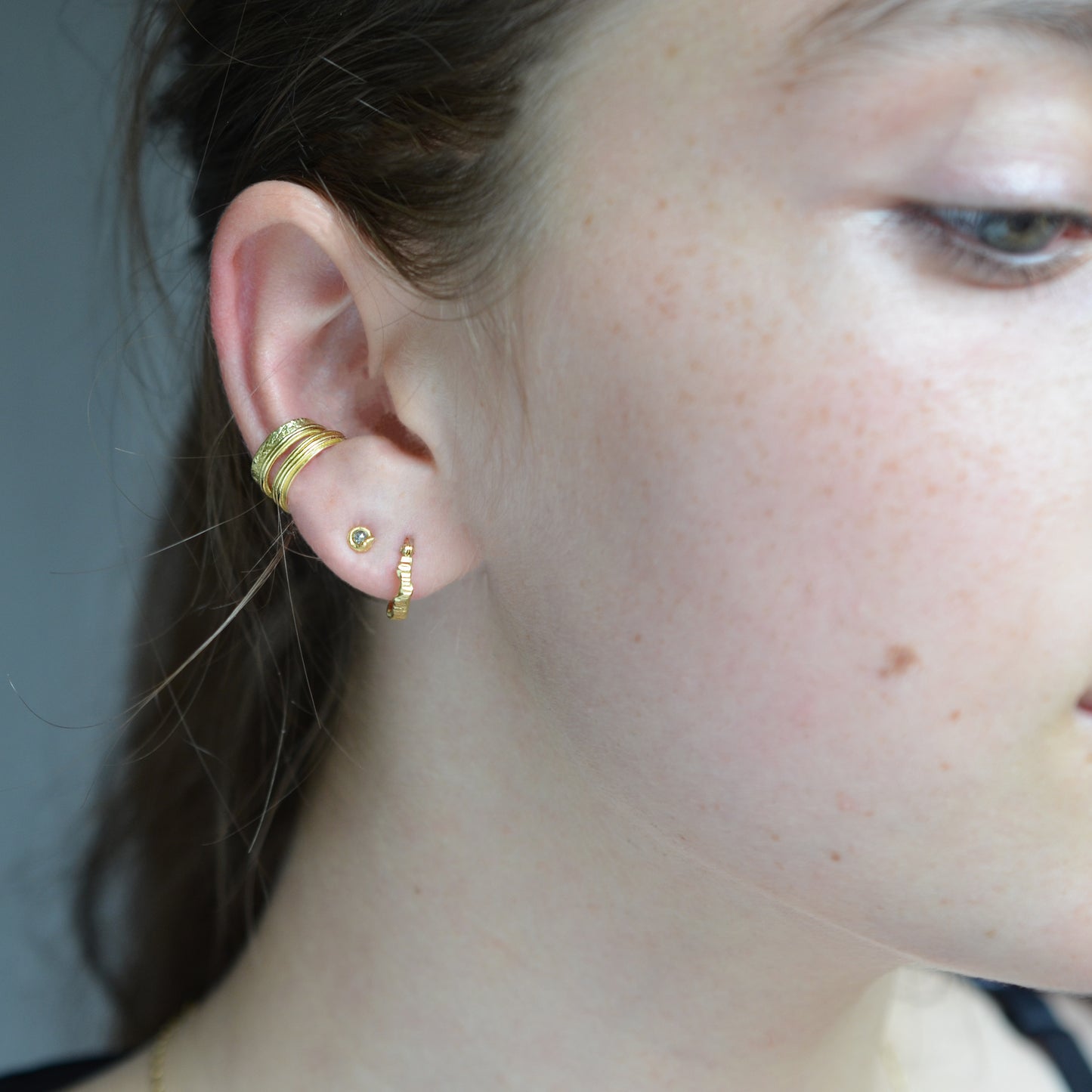 Small molten gold diamond studs