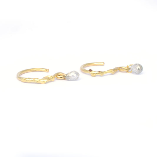 Molten gold hoops with diamond briolette drop
